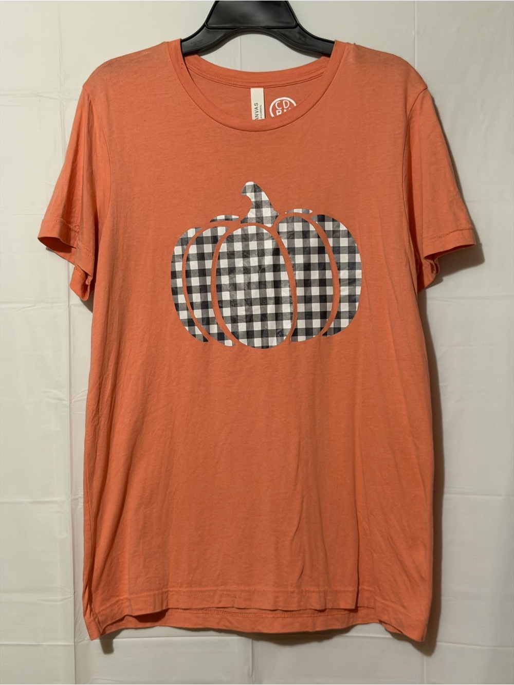 Bella Canvas Coral Orange Short-Sleeve Tee with Black & White Gingham Pumpkin